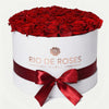 Red Roses in Round Box – Classic Rose Gift Dubai